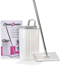 a white mop with a pink handle in front of a box